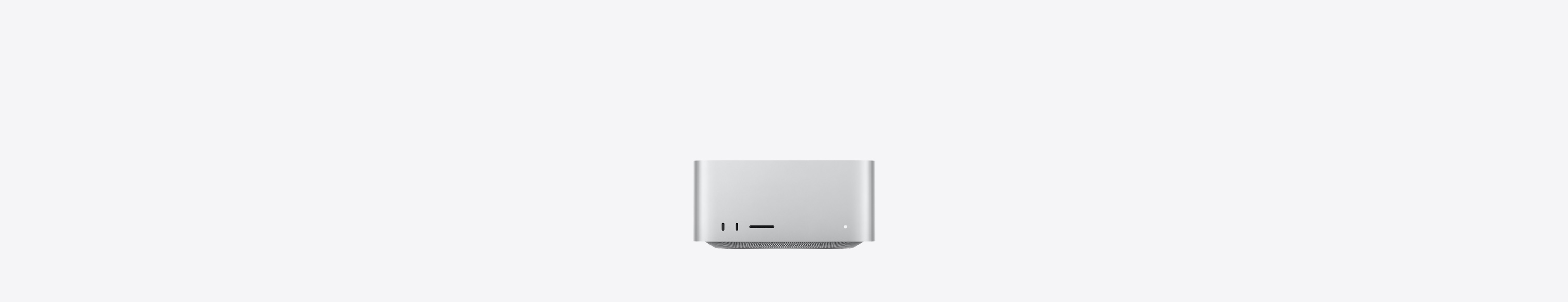 銀色 Mac Studio，正面，兩個 USB-C 連接埠，SDXC 卡插槽、狀態指示燈，以及逐漸收窄的底座；採用平頂、圓渾側邊及平直邊框設計